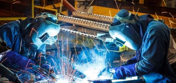 Two Worker With Protective Mask Welding Metal — Structural Steel Fabricators in Rosemount, QLD