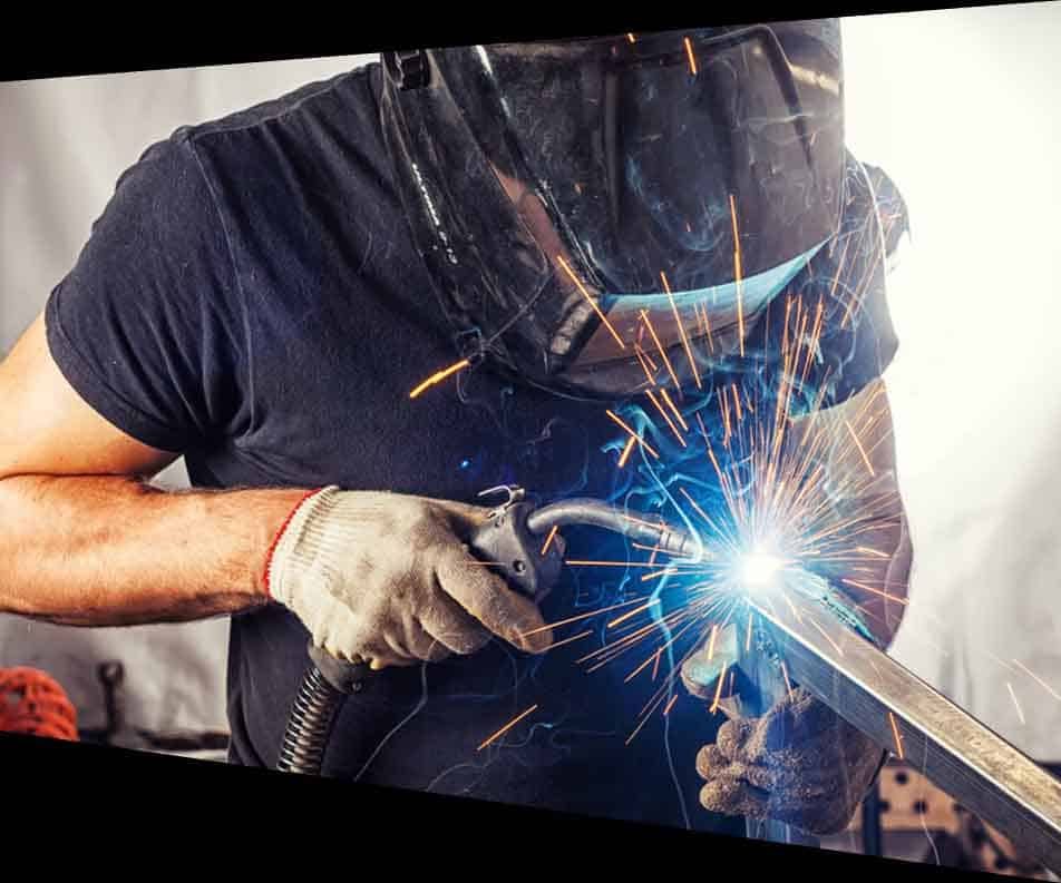 Welder in a Black T-shirt — Structural Steel Fabricators in Rosemount, QLD
